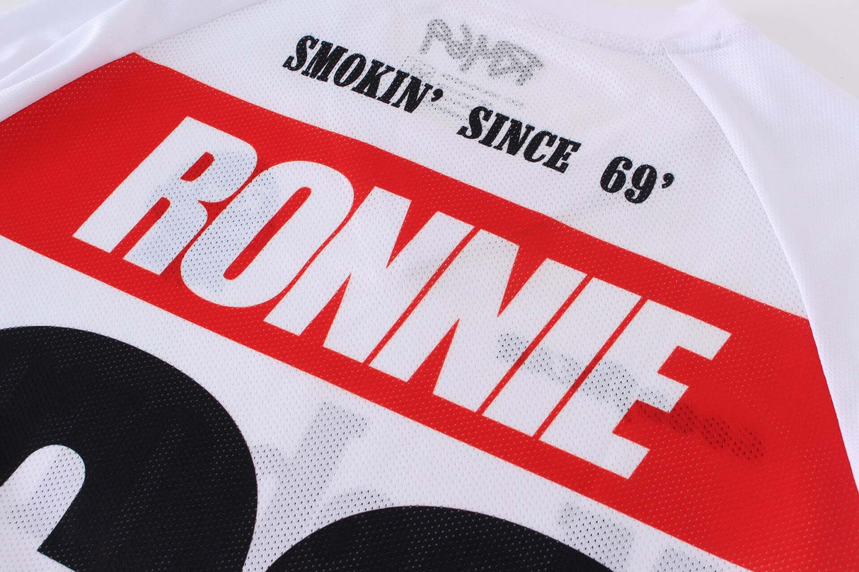Back of Macboro 69 jersey with "Ronnie" and "Smokin' Since 69'" printed, featuring vented polyester mesh.