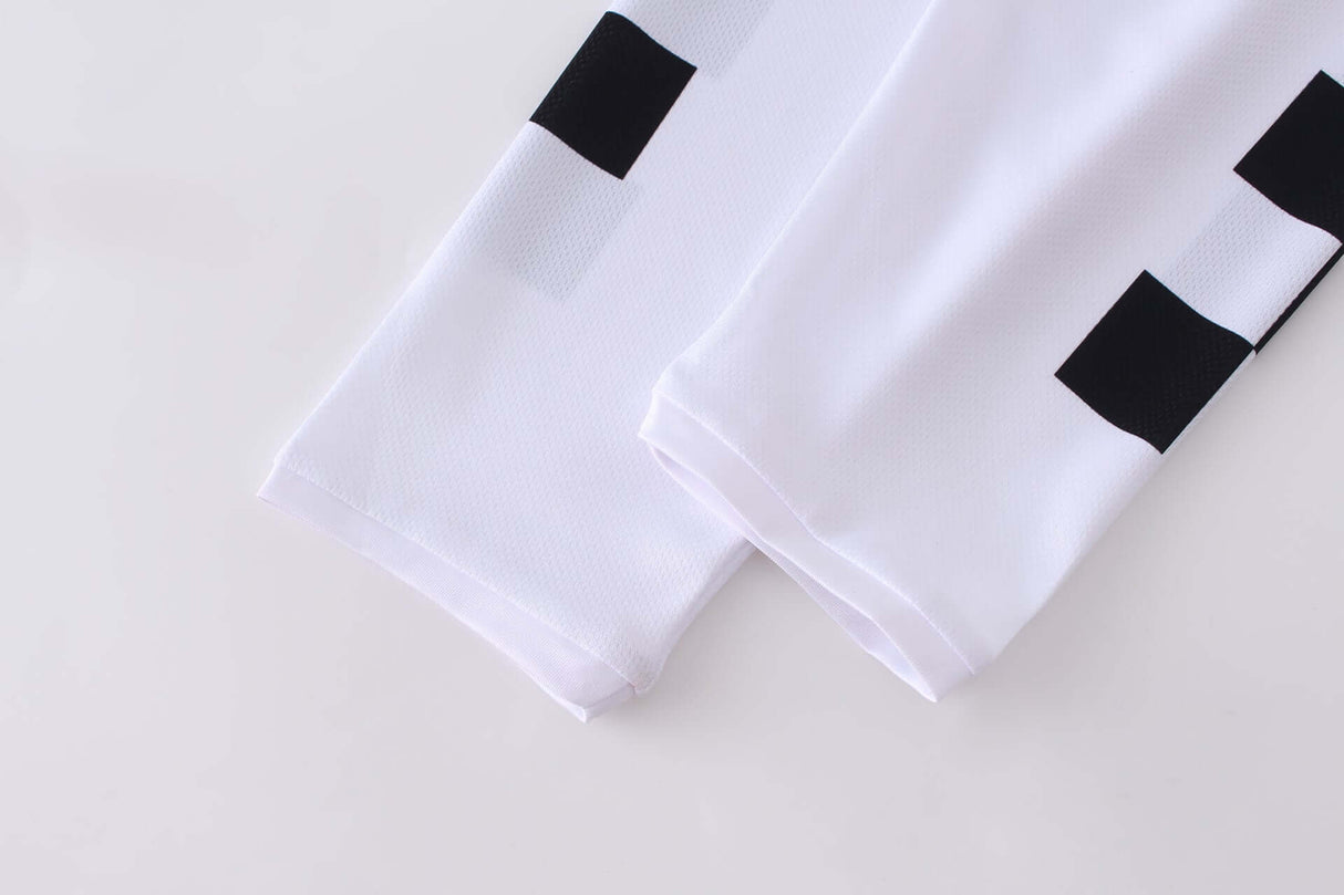 Close-up of Macboro 69 Jersey sleeves showcasing high-quality white vented polyester mesh fabric with black accents.
