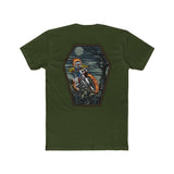Olive green shirt featuring a flaming skeleton rider on a dirt bike, designed in a coffin-shaped frame with a nighttime backdrop.