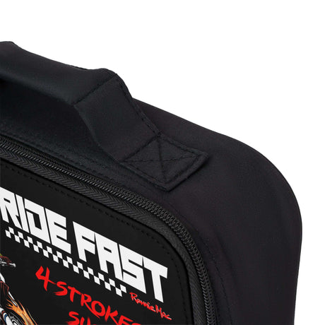 Close-up of the King of Moto Skeleton Lunch Box featuring "Ride Fast" graphics and a sturdy black handle.