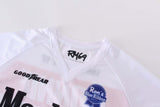 Close-up view of Macboro 69 Jersey showing RM69 logo, white polyester mesh material, and sponsor logos on the front.