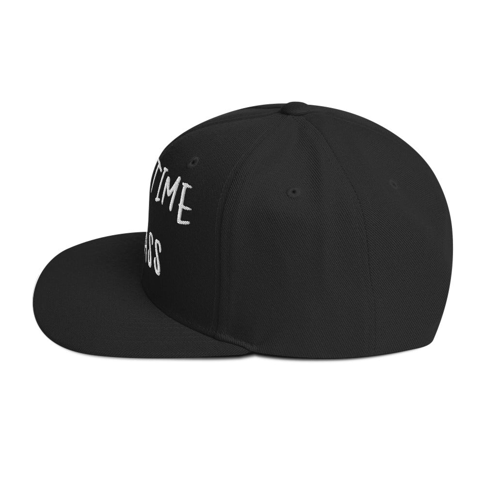 Black Fulltime Badass snapback hat side view with bold embroidered text.