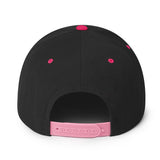 Back view of Fulltime Badass embroidered snapback hat with pink accents and adjustable strap.