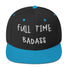 Black and blue snapback hat with "Full Time Badass" embroidered on the front, featuring a classic fit and flat brim.