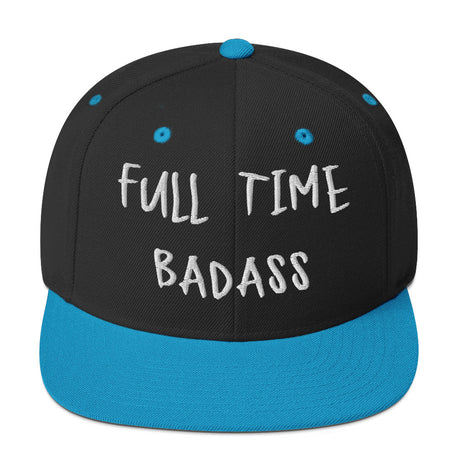 Black and blue snapback hat with "Full Time Badass" embroidered on the front, featuring a classic fit and flat brim.