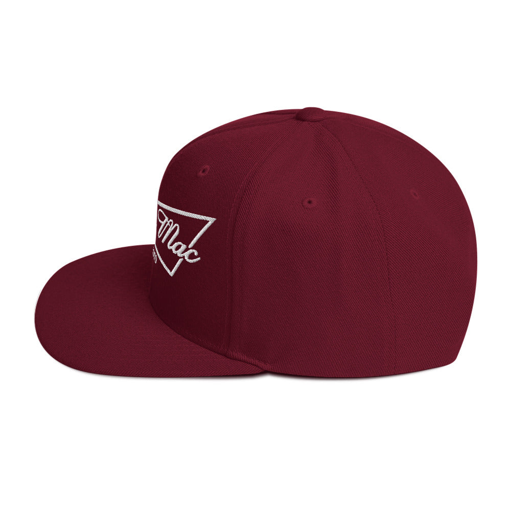 Maroon King of Moto embroidered snapback hat with classic fit and flat brim, side view showing logo design.