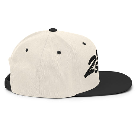 Cream and black "2 Still Smoking" embroidered snapback hat with flat brim and structured fit.