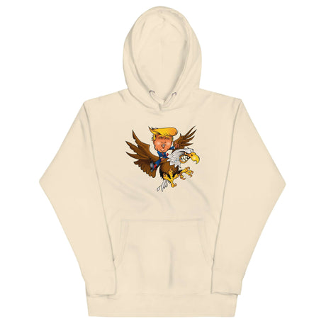 Trump riding a screaming eagle graphic on a beige hoodie, symbolizing leadership and resilience.